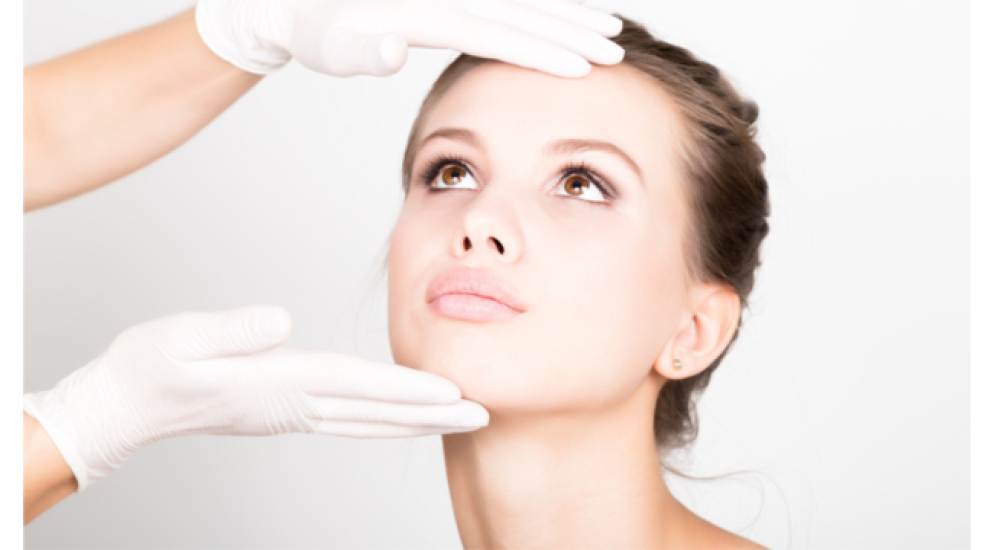 Licensed facial aesthetics practitioner administering botox treatment in Manchester clinic